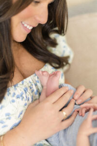 Long Island newborn photos of mom with baby's feet